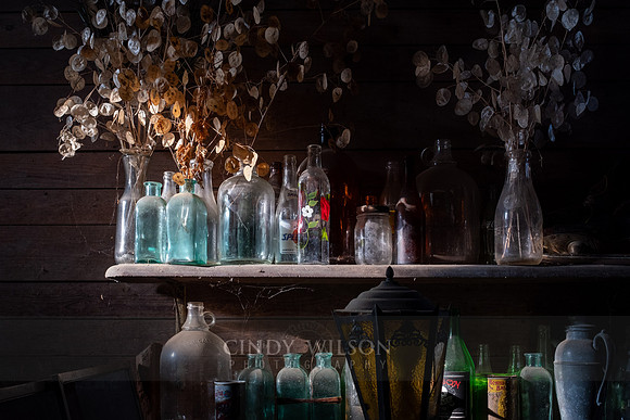 Glass Bottles on a Shelf