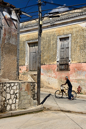 Walking a Bike up the Hill, Gibara, Cuba