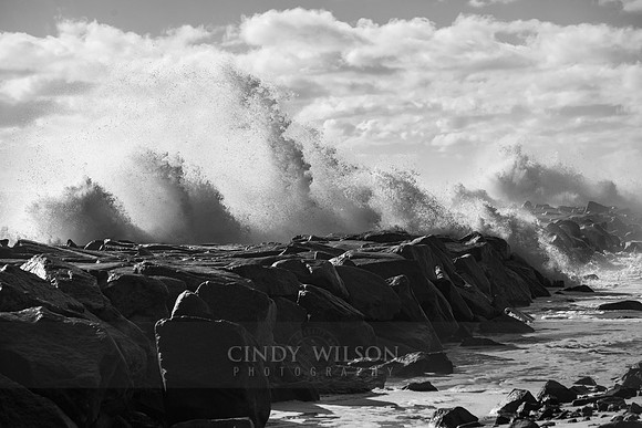 Breaking over the Breakwater